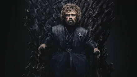 Peter Dinklage as Tyrion Lannister from Game of Thrones sits on the Iron Throne in this HD PC desktop wallpaper and background.