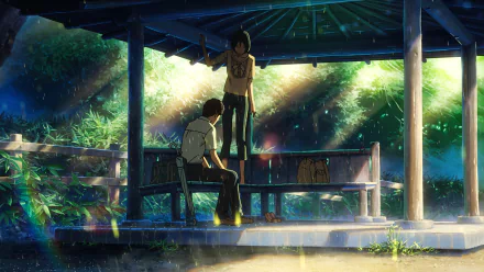 Anime scene from The Garden of Words: two figures in a rain-soaked pavilion surrounded by lush green foliage — 8K Ultra HD PC desktop wallpaper/background.