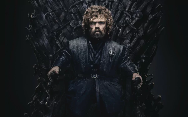 Peter Dinklage as Tyrion Lannister from Game of Thrones sits on the Iron Throne in this HD PC desktop wallpaper and background.