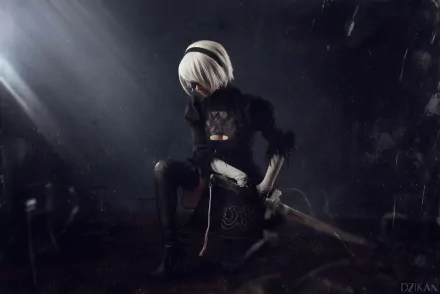 HD PC desktop wallpaper featuring a white-haired woman warrior with short hair, dressed as YoRHa No.2 Type B from NieR: Automata, holding a sword in a dark, atmospheric setting.