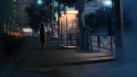 HD desktop wallpaper featuring Takaki Touno from the anime 5 Centimeters per Second. The scene shows a serene night setting with a phone booth glowing softly on a quiet city street.