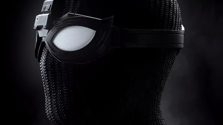 Close-up of Spider-Man's black stealth suit mask with white goggle, moody dark background — 4K Ultra HD PC desktop wallpaper from the movie Spider-Man: Far From Home.