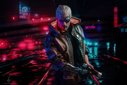 Futuristic warrior in cyberpunk attire from the video game Cyberpunk 2077 against a neon-lit cityscape, HD desktop wallpaper.