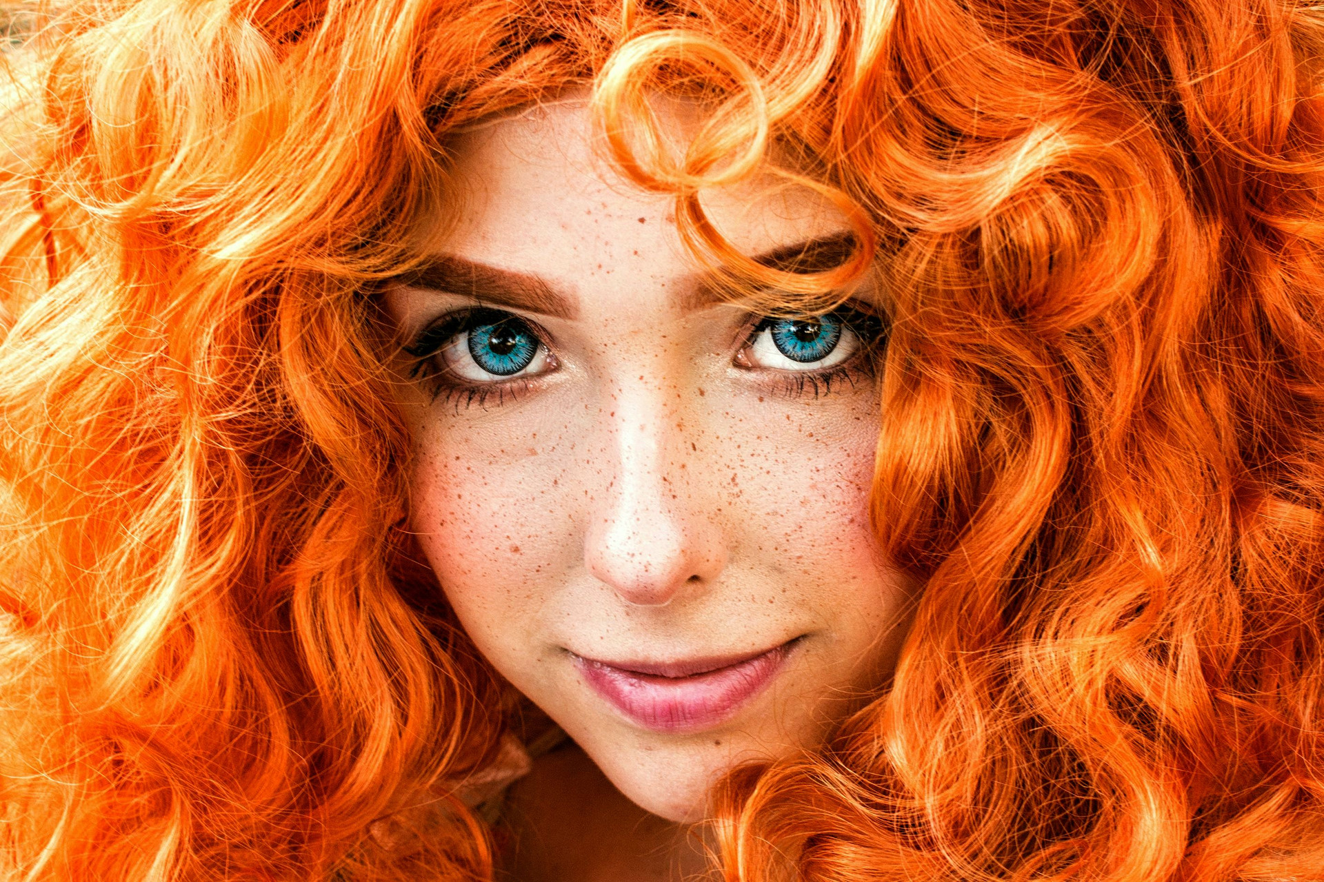 Blue Eyed Freckled Girl With Voluptuous Red Hair