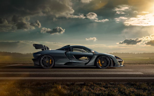 Sleek McLaren Senna supercar captured in stunning 8K Ultra HD, parked on a road under a dramatic sky, showcasing its aerodynamic design and powerful stance.