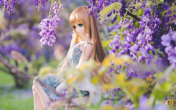 HD desktop wallpaper of a man-made doll with long hair and a floral dress, surrounded by vibrant purple wisteria blossoms in a lush outdoor setting.