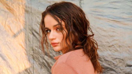 Portrait of brunette American actress Joey King with wavy hair, captured in high-resolution 4K Ultra HD for a PC desktop wallpaper and background.