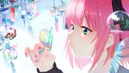 HD PC desktop wallpaper featuring Nino Nakano from the anime The Quintessential Quintuplets, showcasing her pink hair and vibrant, detailed background with glass wind chimes.