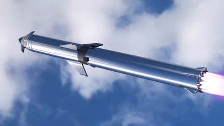 HD desktop wallpaper of SpaceX Starship in mid-flight against a blue sky with clouds.