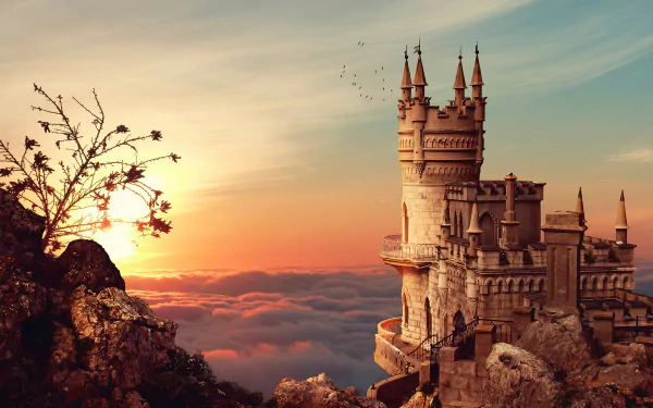 Swallow's Nest castle on a Crimean cliff at sunset — a man-made Gothic turreted fortress above the clouds; 2K Quad HD PC desktop wallpaper background.