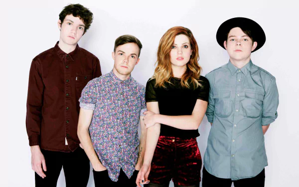 HD desktop wallpaper featuring the band Echosmith with member Sydney Sierota, set against a white background.
