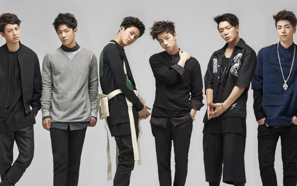 A stylish HD wallpaper featuring the K-pop group iKON poses together, showcasing their unique fashion and dynamic presence against a minimalist background.