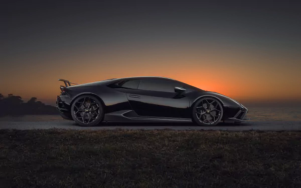 Side profile of a sleek black Lamborghini Huracan Evo supercar at sunset, 4K Ultra HD PC desktop wallpaper background.