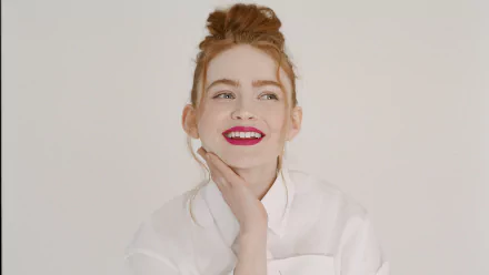 4K Ultra HD image of American actress Sadie Sink with red lipstick, smiling against a plain background, styled for a PC desktop wallpaper.