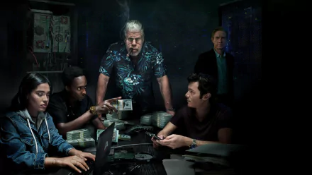 HD wallpaper of a diverse startup team engaged in intense discussion with money on the table, symbolizing entrepreneurship, teamwork, and strategy in a dimly lit room for desktop background.