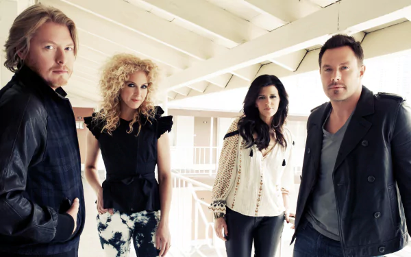 HD desktop wallpaper featuring the band Little Big Town standing together on a porch with a serene expression.