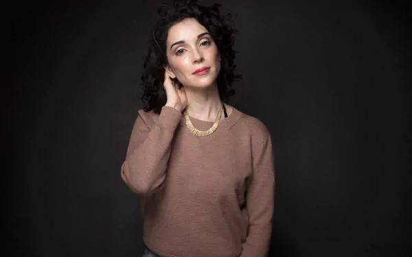 Portrait of St. Vincent, a woman in fashion-forward attire, captured in a 4K Ultra HD music-themed PC desktop wallpaper and background.