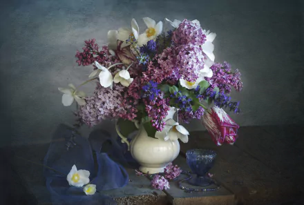 4K Ultra HD PC Desktop Wallpaper and Background — still-life photography of mixed flowers (lilacs, daffodils, tulip) in a cream vase on a moody tabletop with a small glass cup.