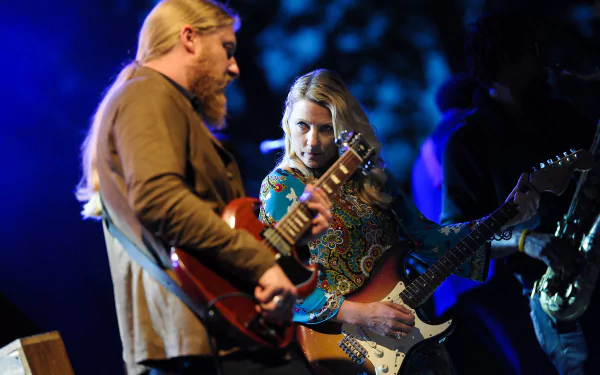 Tedeschi Trucks Band performing on stage, HD desktop wallpaper and background with vibrant lighting.