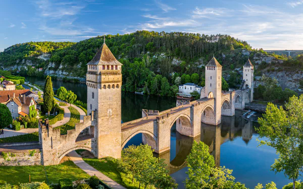  Pont Valentré crossing the Lot river at Cahors, Lot Valley, France by Reinhard Schmid