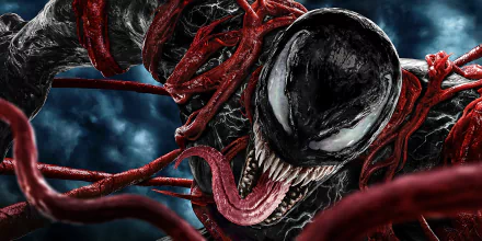 Close-up of Venom from the movie Venom: Let There Be Carnage, featuring detailed black symbiote and red tendrils in an 8K Ultra HD PC desktop wallpaper.