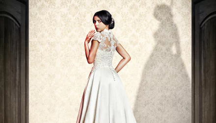 Elegant woman in vintage dress posing for HD desktop wallpaper and background.