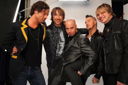 HD wallpaper featuring the band Daughtry with Chris Daughtry and members posing confidently in leather jackets.