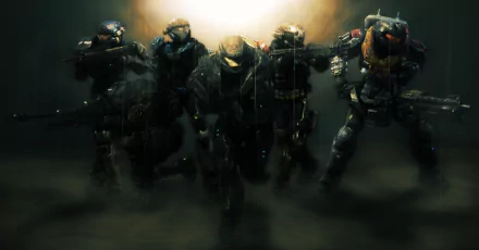 HD PC desktop wallpaper showcasing a dynamic scene from the video game Halo: Reach with armored Spartans advancing through smoky terrain.