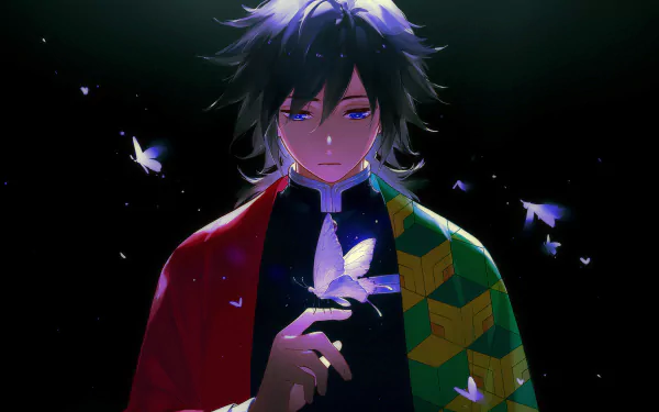 A captivating 4K Ultra HD wallpaper featuring Giyuu Tomioka from the anime Demon Slayer: Kimetsu no Yaiba, showcasing him surrounded by delicate butterflies.