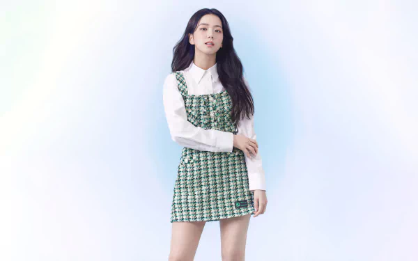 HD desktop wallpaper of Jisoo from BlackPink, showcasing her stylish outfit and confident pose against a clean white background.