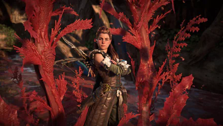 Aloy from the Horizon series stands among crimson Blight flora, poised for battle — 4K Ultra HD PC desktop wallpaper from the video game Horizon Forbidden West.