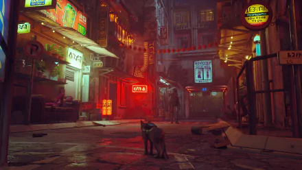 4K Ultra HD PC wallpaper featuring a neon-lit urban alley from the video game Stray, with a lone cat standing in the rain-soaked street under vibrant signs.