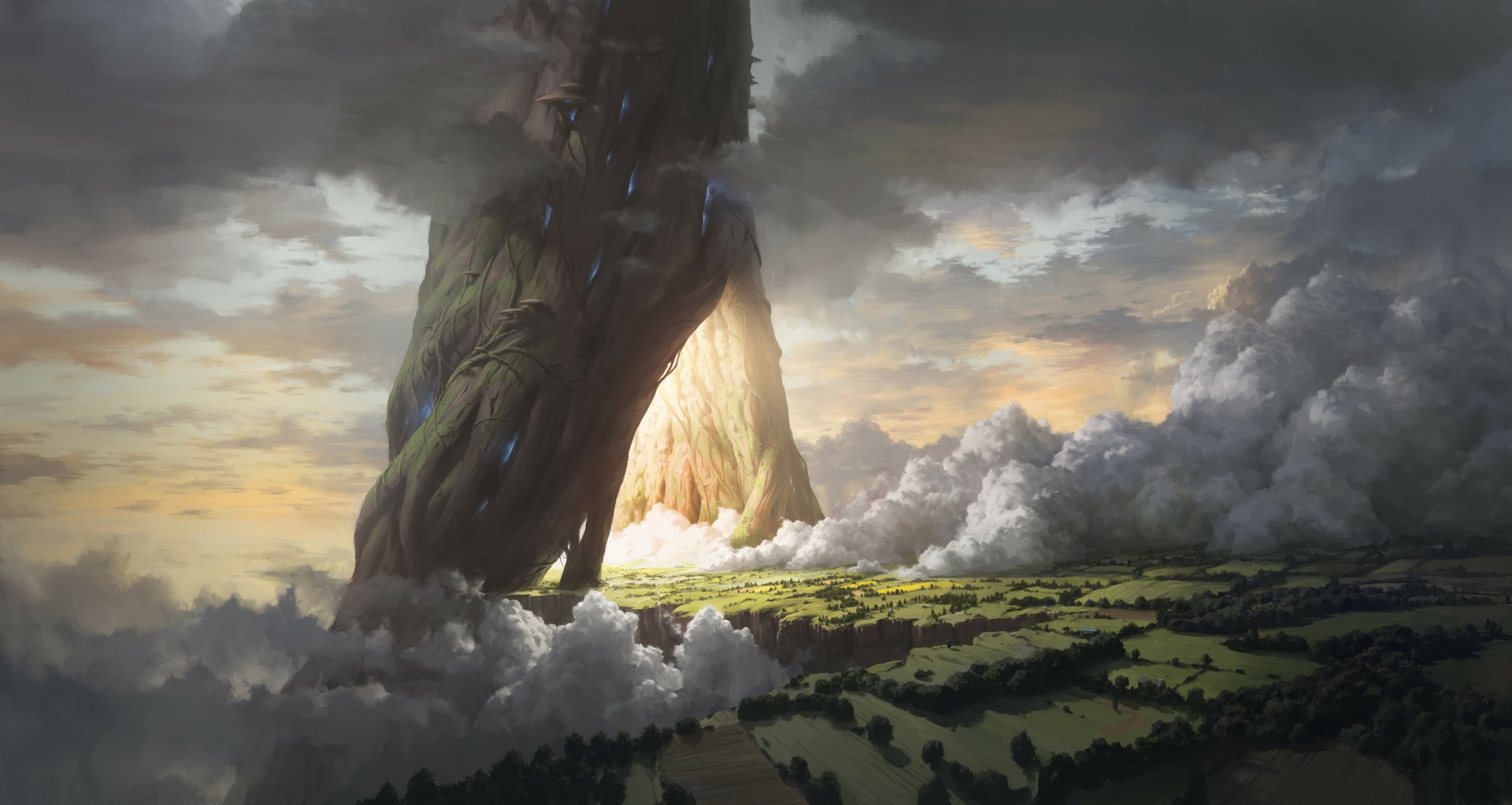 Fantasy HD PC wallpaper depicting a massive, glowing portal emerging from a towering rock formation above a misty, cloud-covered landscape at sunrise.