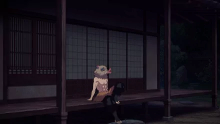 HD PC desktop wallpaper featuring Inosuke Hashibira from the anime Demon Slayer: Kimetsu no Yaiba, sitting contemplatively on a traditional porch at night.