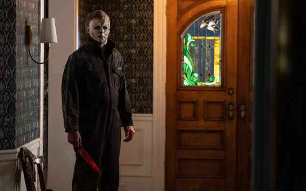 Menacing Michael Myers in eerie Halloween Ends movie wallpaper for HD desktop background.