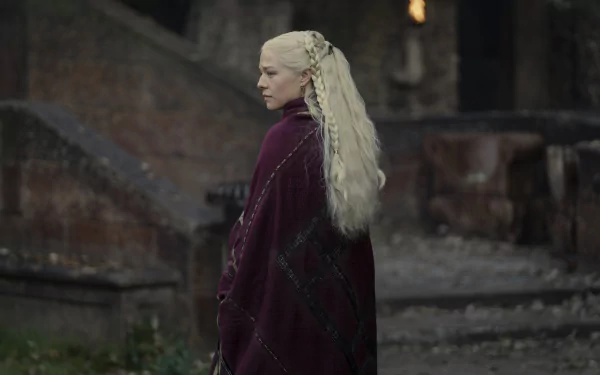 Rhaenyra Targaryen from House of the Dragon in a burgundy cloak with a long platinum braid, standing on stone steps — 4K Ultra HD PC desktop wallpaper.