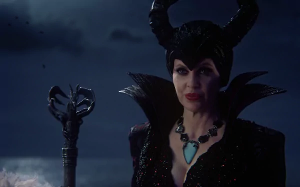 HD PC desktop wallpaper: Maleficent from the TV show Once Upon a Time — horned, black-clad villainess with turquoise pendant and twisted staff against a stormy night sky.