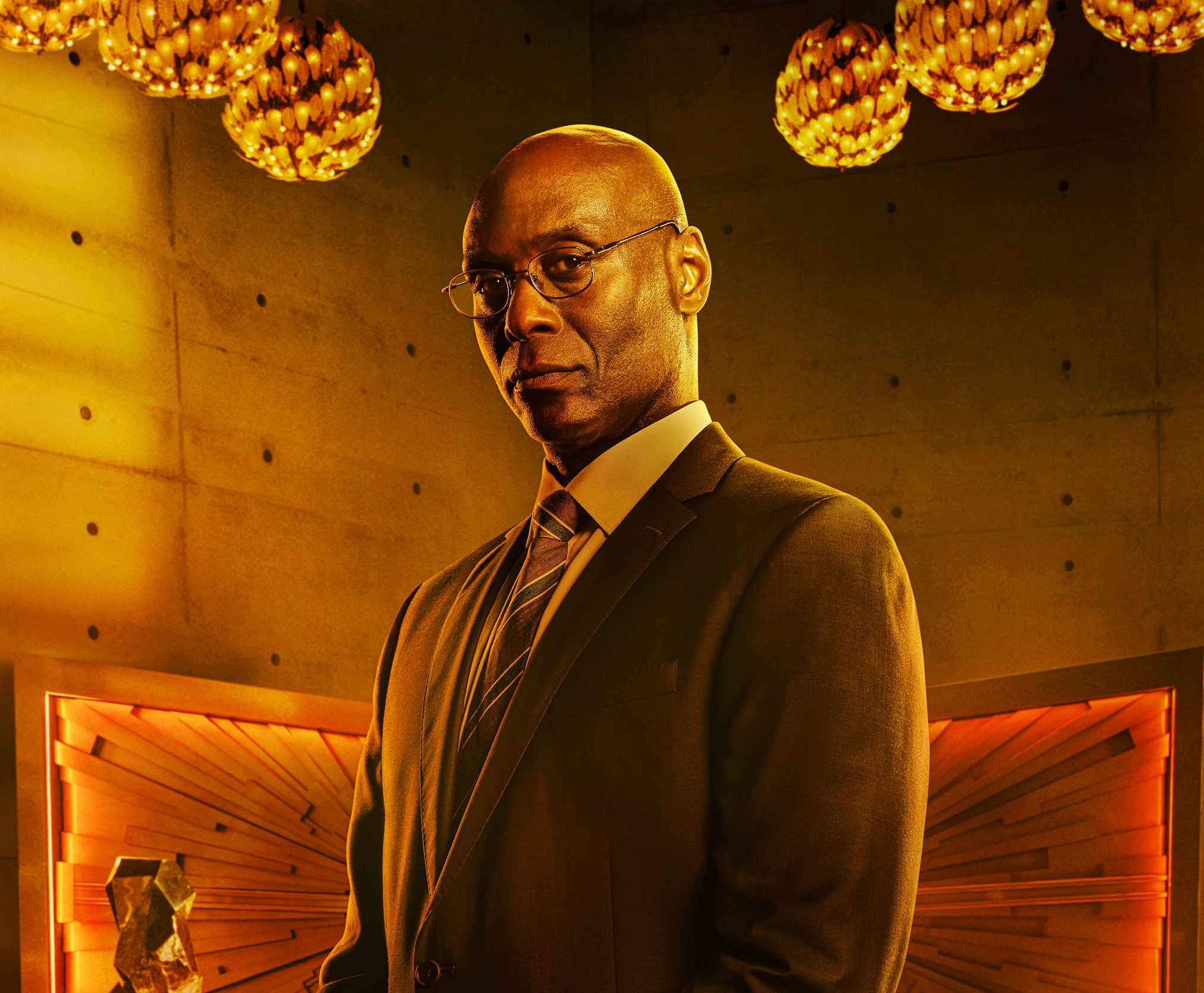 Lance Reddick as a striking character in a John Wick: Chapter 4 wallpaper for a sleek desktop background.