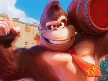 Donkey Kong from the Super Mario Bros. (2023) movie, grinning and hoisting a red barrel — 2K Quad HD PC desktop wallpaper/background.
