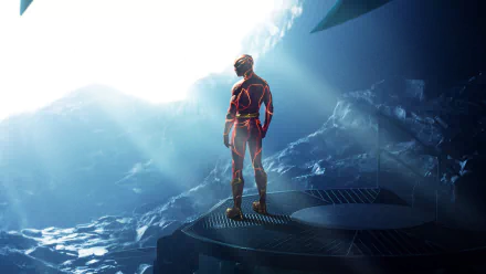 The Flash (2023) movie 2K Quad HD PC desktop wallpaper — The Flash stands on a rocky platform bathed in blue light and mist, facing a bright opening.