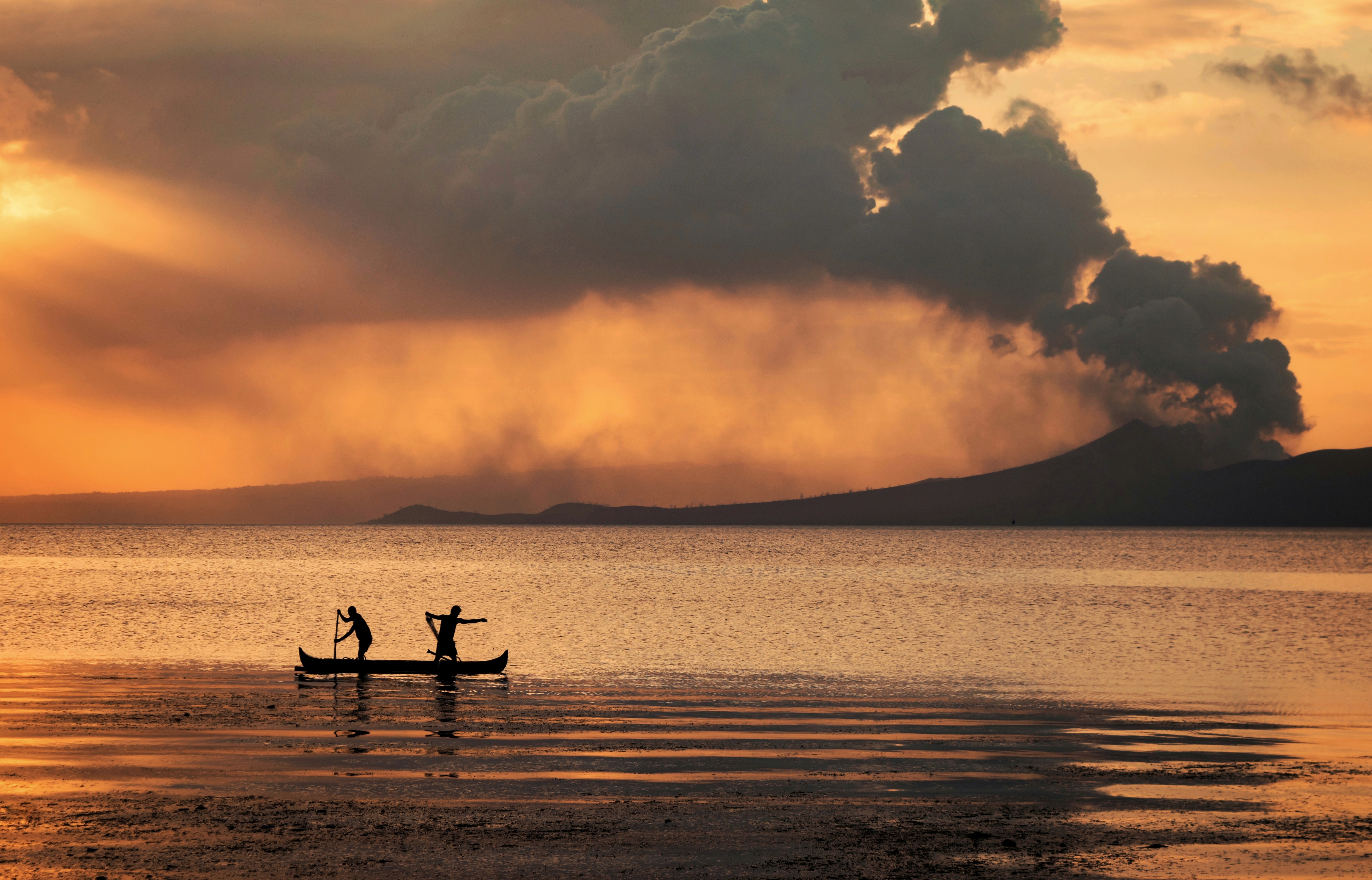 Locals fishing in Taal Lake despite of the danger brought by Taal Volcano Eruption by Michael Angelo Luna
