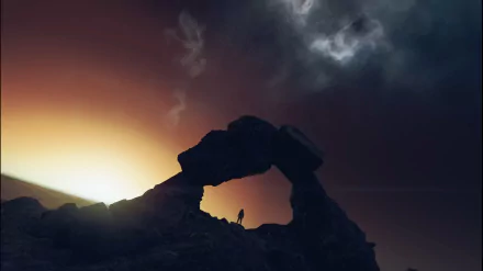HD PC desktop wallpaper from the video game Starfield showing a silhouetted figure under a natural rock arch with a glowing sky and cosmic clouds.