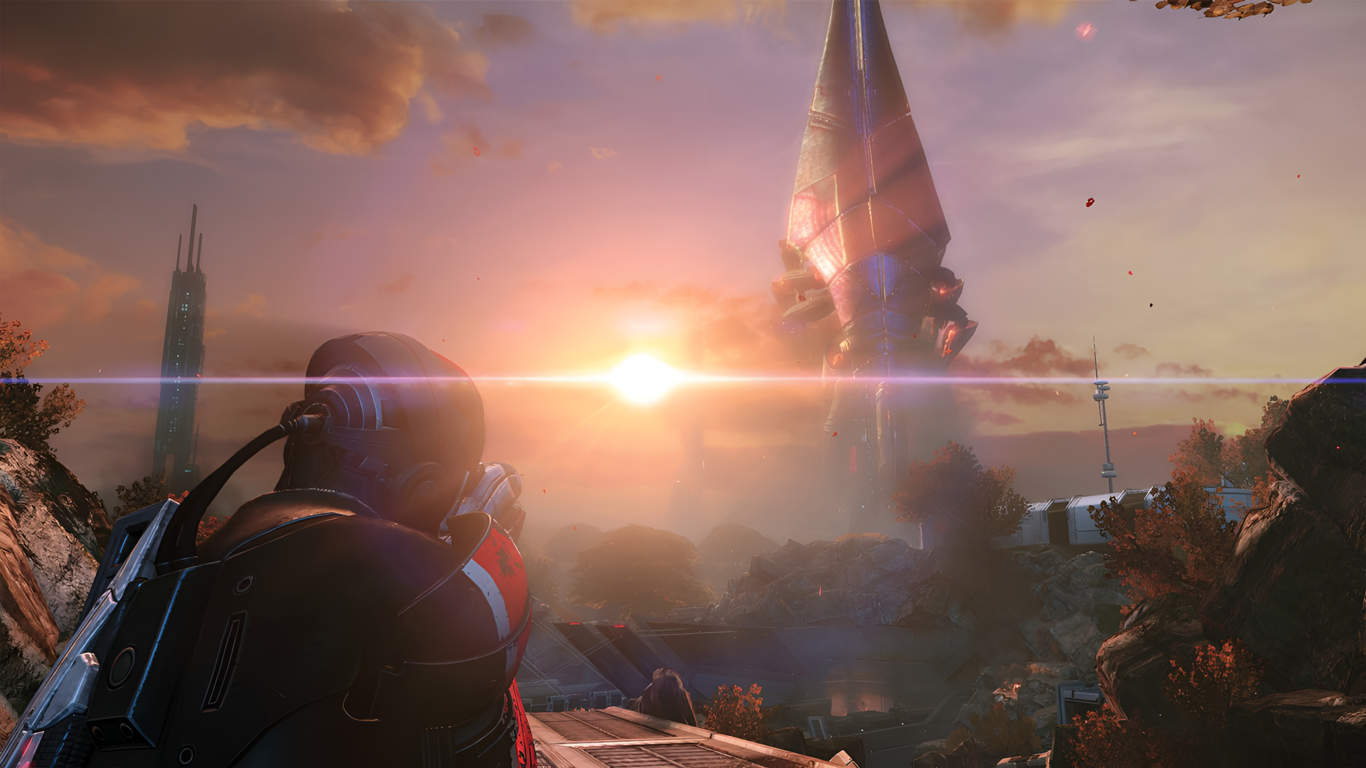 HD wallpaper featuring a scene from Mass Effect Legendary Edition with a character overlooking a sunset on an alien planet.