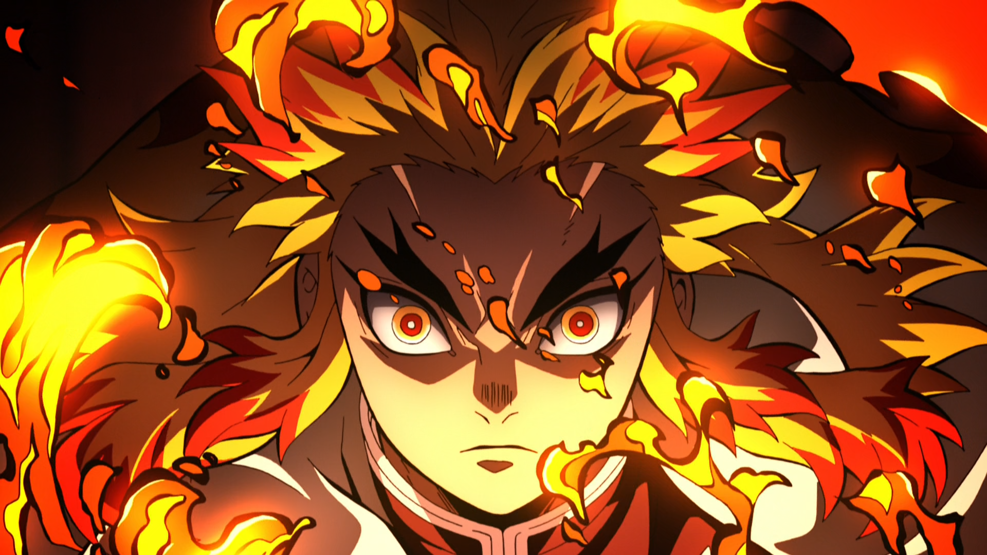 HD PC desktop wallpaper featuring Kyojuro Rengoku from Demon Slayer: Kimetsu no Yaiba, depicted with intense fiery flames in vibrant anime style.