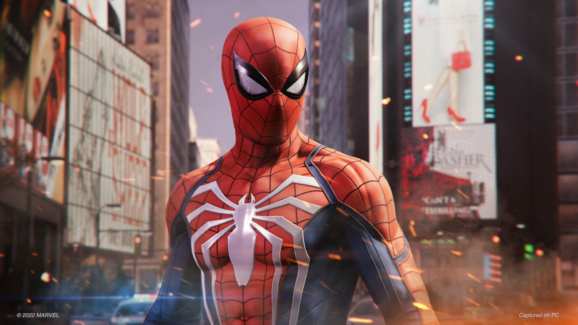 HD desktop wallpaper of Spider-Man from Marvel's Spider-Man Remastered video game, posed in an urban setting with vibrant city background.