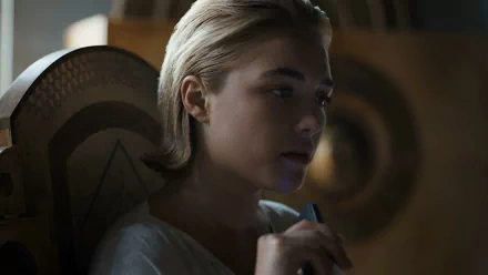 A close-up of Florence Pugh in a contemplative moment from Dune: Part Two, captured in a high-definition desktop wallpaper, showcasing her intricate character in the film.