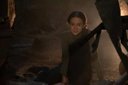 HD desktop wallpaper featuring a young girl peeking from behind a dark, rugged structure in a mysterious setting, tagged with #65 for a captivating background theme.