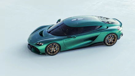 A stunning Koenigsegg Gemera showcased in vibrant green, set against a sleek background, making a striking HD desktop wallpaper and background.