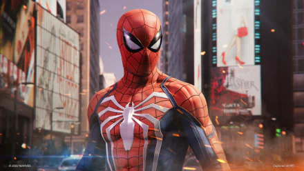 HD desktop wallpaper of Spider-Man from Marvel's Spider-Man Remastered video game, posed in an urban setting with vibrant city background.