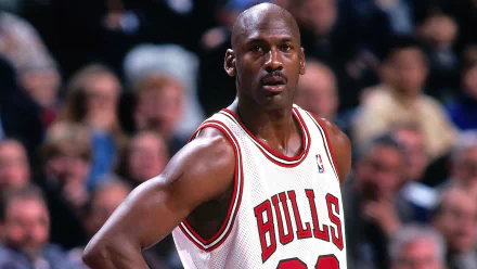 HD desktop wallpaper depicting Michael Jordan in his Chicago Bulls uniform during an NBA game.
